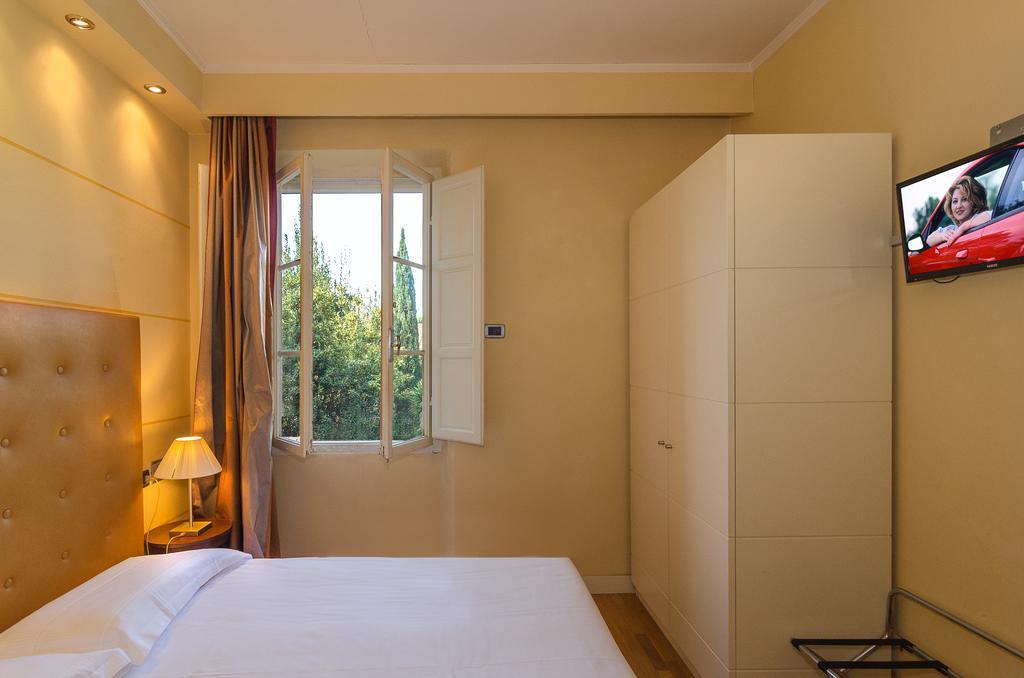 Hotel Novecento Pisa Bagian luar foto