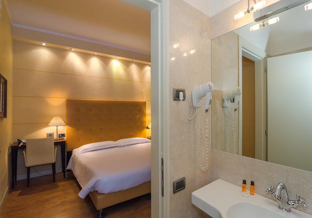 Hotel Novecento Pisa Bagian luar foto