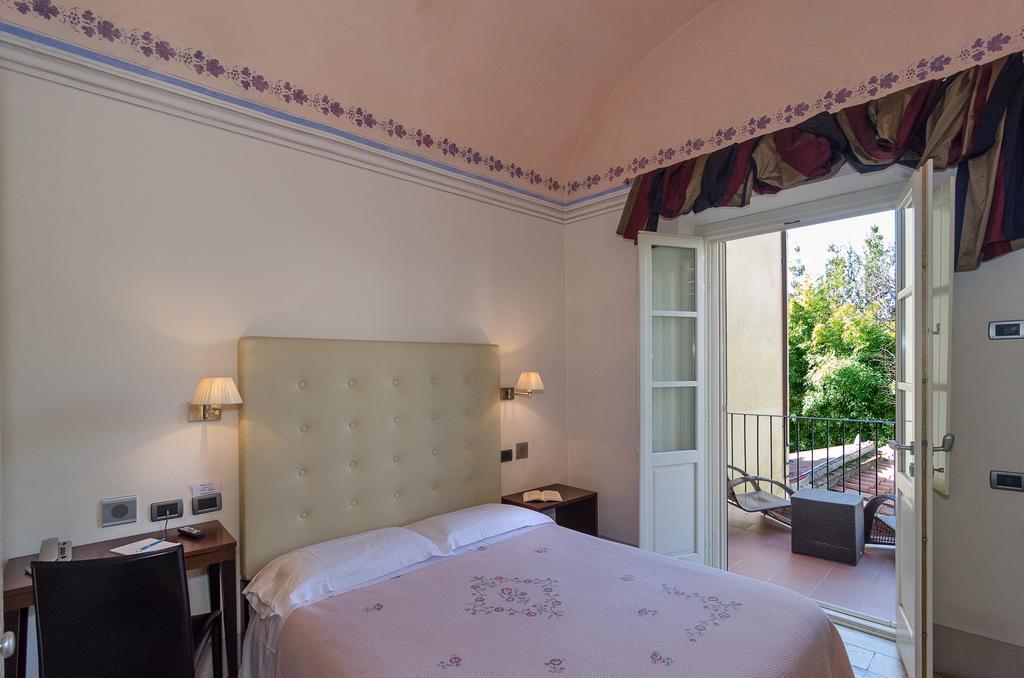 Hotel Novecento Pisa Bagian luar foto