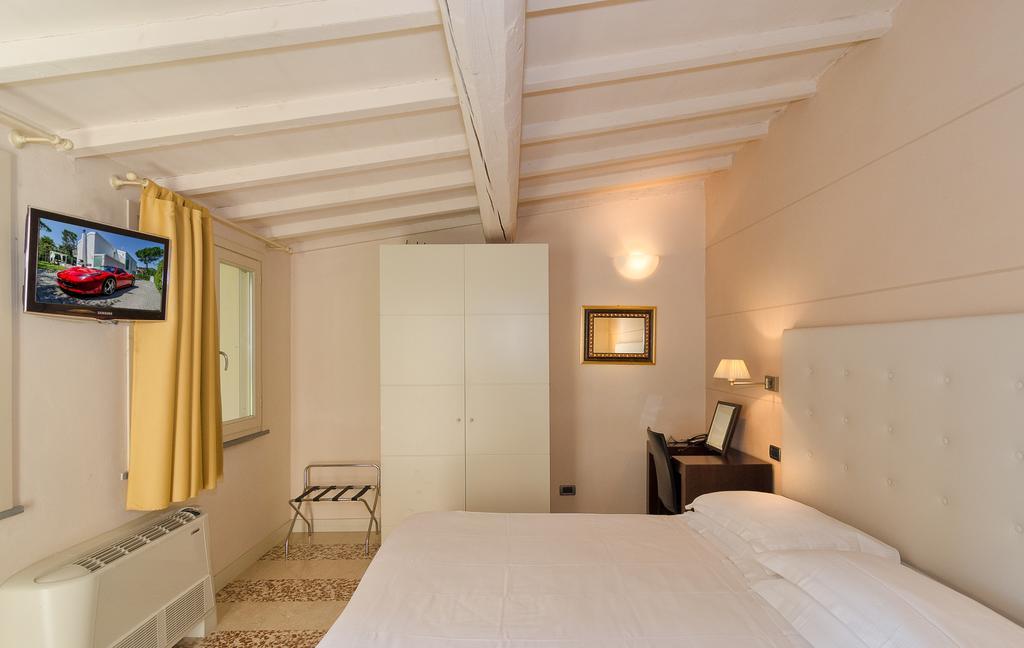 Hotel Novecento Pisa Bagian luar foto
