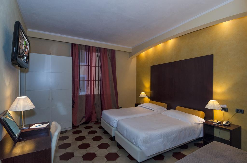 Hotel Novecento Pisa Bagian luar foto