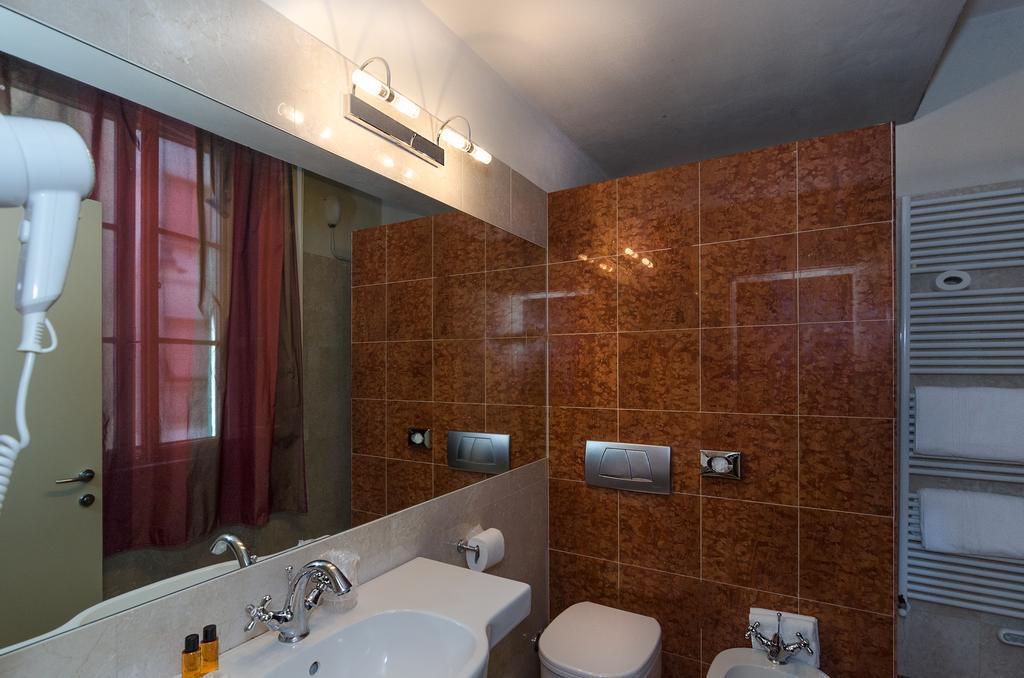 Hotel Novecento Pisa Bagian luar foto