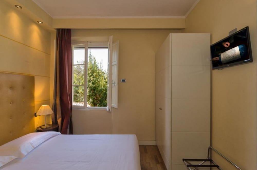 Hotel Novecento Pisa Bagian luar foto
