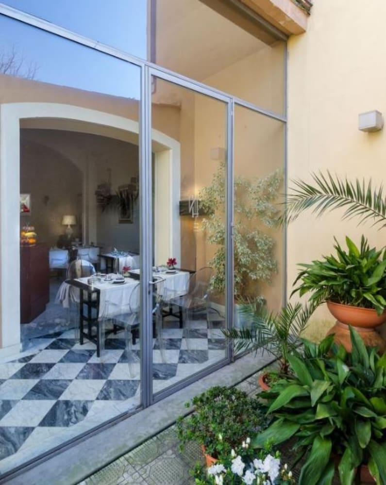 Hotel Novecento Pisa Bagian luar foto